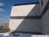 Erecting stone panels at the 2nd floor roof East Elevation.jpg